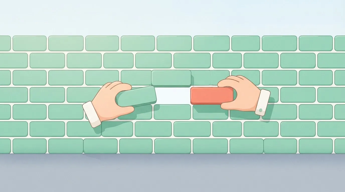 A hand sliding a single brick out of a wall and sliding a different colored brick into the exact same slot without…